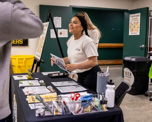 Student helping at Tiger Pantry.