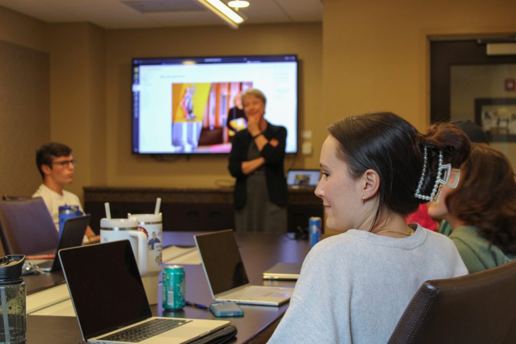 Student at committee meeting.